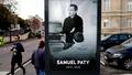 Une affiche du professeur Samuel Paty placée au centre-ville de Conflans-Sainte-Honorine, le 3 novembre 2020.